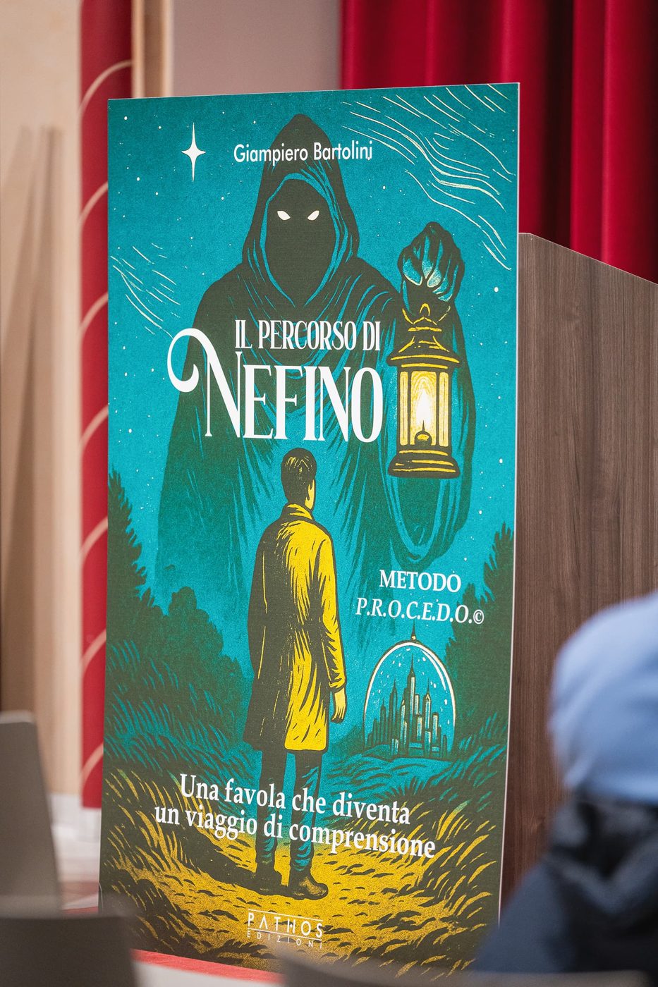 Il roll-up del libro a una presentazione